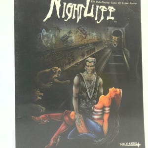 May include: A dark cover for the role-playing game "Nightlife" featuring a stylized illustration. The artwork depicts a male figure and a woman, along with other figures and the text "Nightlife" in a stylized font. The Stellar Games logo is visible.