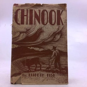 May include: Vintage book cover with the title "CHINOOK" in large, bold letters. The cover features a sepia-toned illustration of a farmer with a cow plowing a field under a cloudy sky. The author's name, Lisbeth Fish, is printed at the bottom.