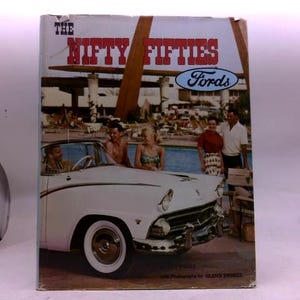 May include: A vintage book cover titled "The Nifty Fifties" featuring a white Ford convertible with people near a pool. The Ford logo is visible. The cover has a retro design with a sunny, vacation theme.