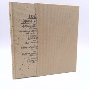 May include: A brown book with a textured cover. The title is "106 AND ALL THAT" and the text describes a memorable history of England. The book is by Walter Carruth and Robert Julian, illustrated by John Reyng.