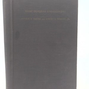 May include: A hardcover book titled "BASIC NUCLEAR ENGINEERING" by Arthur R. Foster and Robert L. Wright, Jr. The book has a dark gray cover with the title and author's names in a lighter font. The spine is also dark gray.