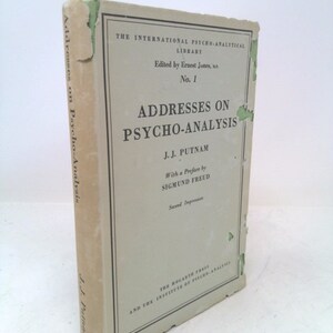 May include: A vintage book titled "Addresses on Psycho-Analysis" by J.J. Putnam, edited by Ernest Jones. The cover features a cream-colored background with black text and a decorative border. The book is part of "The International Psycho-Analytical Library."