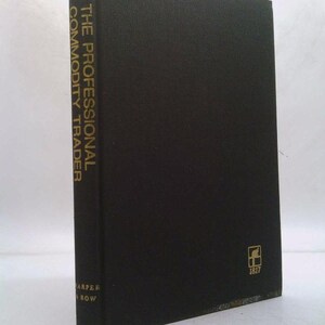 May include: A hardcover book titled "The Professional Commodity Trader" by Perry J. Kaufman. The book has a black cover with gold lettering and a small logo. Published by Harper & Row.