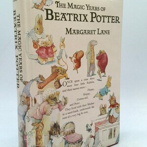 May include: A hardcover book titled "The Magic Years of Beatrix Potter" by Margaret Lane. The cover features illustrations of rabbits and other animals in a storybook style. The book's spine displays the title and author's name.