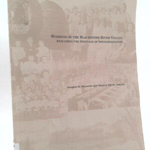 May include: A book cover with the title "Working in the Blackstone River Valley: Exploring the Heritage of Industrialization." The cover features sepia-toned images of people and industrial scenes. The authors are Douglas M. Reynolds and Marjory Myers, Editors.