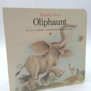 May include: A book cover with the title "Olifhaunt" in pink and black lettering. The book is part of a series called "Beastly Verse" and is illustrated by Hank Hinton. The cover features a cartoon illustration of a gray elephant running with its trunk raised.
