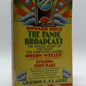 May include: Vintage paperback book titled "The Panic Broadcast" by Howard Koch. The cover features a retro illustration of a radio, flying saucers, and the text "Invasion From Mars". The book includes the complete script and articles.