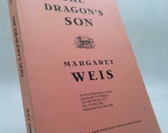 May include: Advance uncorrected proof cover of the book "The Dragon's Son" by Margaret Weis. The cover is pink with a black and white illustration of a dragon. The book is a Tom Doherty Associates book.