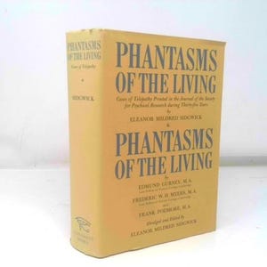 May include: A hardcover book titled "Phantasms of the Living" with a light tan cover and dark text. The book's title is prominently displayed, along with the names of the authors. The book appears to be an older edition.