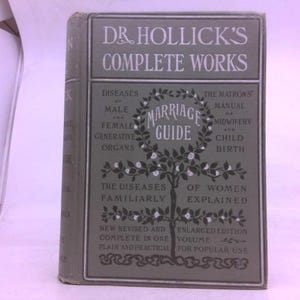 May include: A vintage hardcover book titled Dr. Hollick's Complete Works, featuring a sage green cover with dark green text and a central tree illustration. The cover includes the text Marriage Guide, Diseases of Male and Female Generative Organs, The Matrons' Manual of Midwifery and Child Birth, and The Diseases of Women Familiarly Explained.