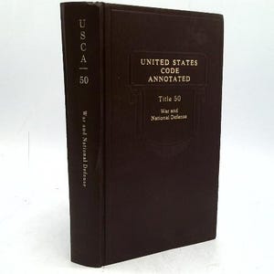 May include: A brown hardcover book titled "United States Code Annotated, Title 50, War and National Defense." The spine reads "USCA 50" and "War and National Defense."
