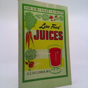 May include: A green book with the title "Live Food Juices" in red and white letters. The book cover features a glass of red juice, carrots, and other vegetables. The book is by H.E. Kirschner, M.D. and is for "vim, vigor, vitality."