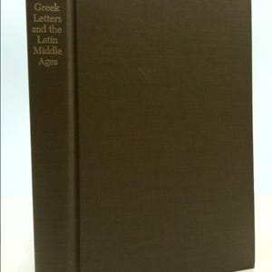 May include: A brown hardcover book with the title "Greek Letters and the Latin Middle Ages" by Berschin. The book is published by CUA Press.