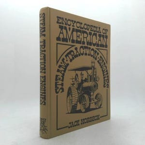 May include: A hardcover book titled "Encyclopedia of American Traction Engines" by Jack Norbeck. The cover is tan with black text and an illustration of a steam traction engine. The spine reads "Steam Traction Engines".