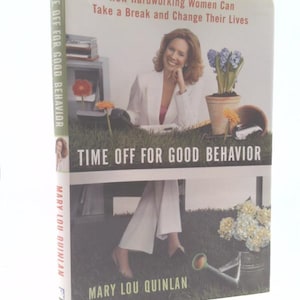 May include: A hardcover book titled "Time Off for Good Behavior" by Mary Lou Quinlan. The cover features a woman in a white blazer, with text that reads "How Hardworking Women Can Take a Break and Change Their Lives."