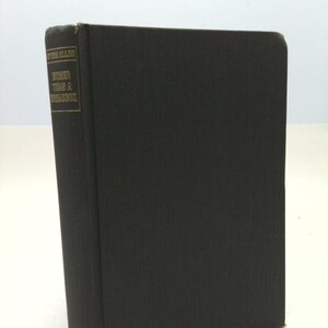 May include: A hardcover book with a black cover and a gold title on the spine. The book's title is "OTHER THAN A DREAMBOX" by Peter Allen. The publisher's name, DOUBLEDAY, is printed at the bottom of the spine.
