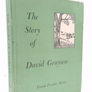 May include: A green book cover with the title "The Story of David Grayson" by Frank Prentice Rand. The cover features a black and white illustration of a tree and a path leading to a house.