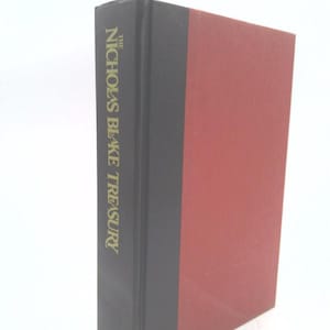 May include: A hardcover book titled "The Nicholas Blake Treasury." The spine is black with gold lettering, and the cover is a deep red. The publisher's name, Nelson Doubleday, is printed at the bottom of the spine.