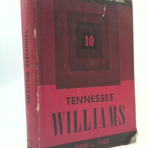 May include: A vintage book titled "Tennessee Williams" from the Twayne's United States Authors Series. The cover is primarily red with black text and a central design featuring the number 10. The book's spine displays the author's name vertically.