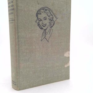 May include: A rustic wooden sign with the text "Welcome to our home" in white lettering. The sign features a distressed finish and a simple, inviting design, perfect for front door decor.