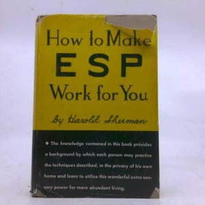May include: A vintage book titled "How to Make ESP Work for You" by Harold Sherman. The book has a yellow cover with black text and a black band at the bottom with additional text. The cover is slightly worn.