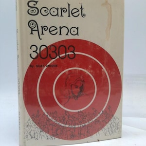 May include: A hardcover book titled "Scarlet Arena" with a red circular design on the cover. The title is in a decorative font, and the number "30303" is below it. The author's name, Silas Moore, is also visible.