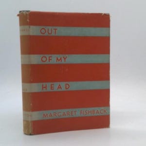 May include: A vintage book titled "Out of My Head" by Margaret Fishback. The book has a red cover with horizontal light blue stripes. The spine is a tan color, and the book appears to be in good condition.