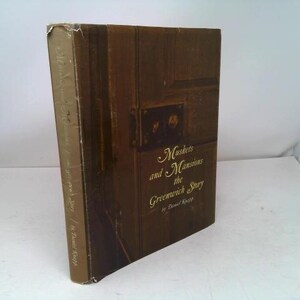 May include: A vintage hardcover book titled "Muskets and Mansions the Greenwich Story" by Daniel Knapp. The book has a brown cover with gold lettering and a distressed appearance, suggesting age and historical significance.
