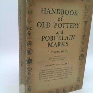 May include: A rustic wooden sign with the text "Welcome to our home" in white lettering. The sign features a distressed finish and a simple, inviting design, perfect for front door decor.