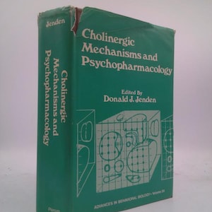 May include: A hardcover book titled "Cholinergic Mechanisms and Psychopharmacology" edited by Donald J. Jenden. The book is green with white text and features a diagram on the cover. The book is part of the "Advances in Behavioral Biology" series.