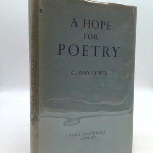 May include: A blue book with the title "A Hope for Poetry" by C. Day Lewis. The book is published by Basil Blackwell, Oxford.