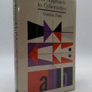 May include: A hardcover book titled "An Approach to Cybernetics" by Gordon Pask. The cover features geometric shapes in black, orange, and purple. The book is part of the Harper Science Today series.
