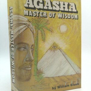 May include: A vintage book titled "AGASHA MASTER OF WISDOM" by William Eisen. The cover features an illustration of a man with a turban, a pyramid with an eye, and a palm tree, all set against a yellow background.