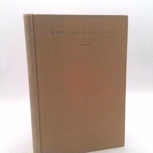 May include: A tan-colored book with the title "The Span of Life" in gold lettering.