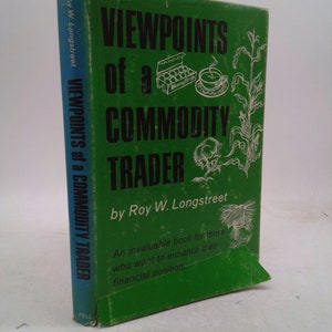 May include: Green book cover with the title "Viewpoints of a Commodity Trader" by Roy W. Longstreet. The book cover features illustrations of corn, a cup of coffee, and a carton of eggs.