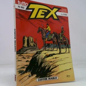 May include: A vintage comic book titled "TEX" with a red cover featuring two riders on horseback in a desert landscape. The title is in yellow, and the book is labeled "Canyon Diablo."