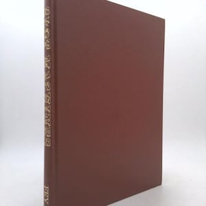 May include: A hardcover book with a solid brown cover. The spine features gold lettering that reads "PLOT MATTERS" vertically, with "FEY" below. The book is slightly angled, showcasing its cover and spine.
