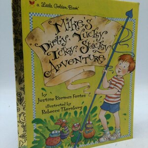 May include: A Little Golden Book titled "Mike's Dirty, Yucky, Icky, Sticky Adventure." The cover features a boy holding a blue staff, with the title on a scroll. The book is illustrated by Rebecca Thornburg.