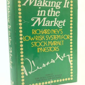 May include: A hardcover book titled "Making It in the Market" by Richard Ney. The book has a green cover with white and yellow text. The title is in large, elegant script. The book is for stock market investors.