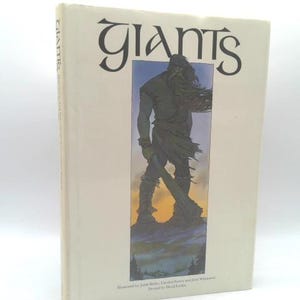 May include: A hardcover book titled "Giants" with a cream-colored cover. The cover features an illustration of a giant figure with long hair and a sword. The title is in a stylized font. The book is a fantasy genre.