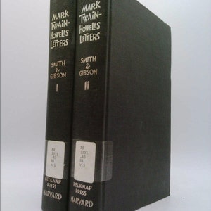 May include: Two black hardcover books titled "Mark Twain-Howells Letters" by Smith & Gibson. The books are volumes 1 and 2 of the series and are published by the Belknap Press of Harvard University.