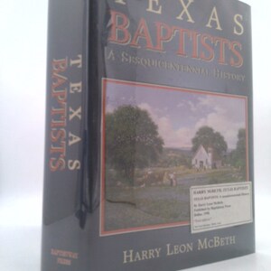 May include: A blue hardcover book titled "Texas Baptists: A Sesquicentennial History" by Harry Leon McBeth. The cover features a painting of a white church in a rural setting.