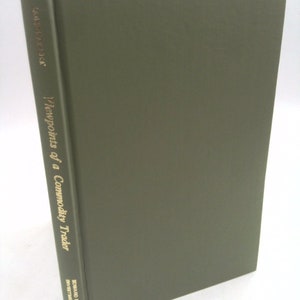 May include: A green hardcover book titled "Viewpoints of a Commodity Trader" by Donald D. Dorsey, Investment Advisor.
