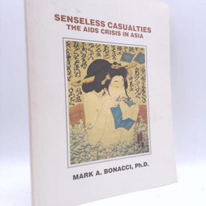 May include: Book cover with the title "Senseless Casualties: The AIDS Crisis in Asia" and an illustration of a woman in a bath. The author is Mark A. Bonacci, Ph.D.