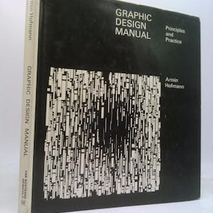 May include: A hardcover book titled "Graphic Design Manual" by Armin Hofmann. The cover is black with white text and a geometric design. The spine displays the title and author's name.