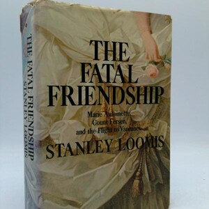 May include: A hardcover book titled "The Fatal Friendship" by Stanley Loomis. The cover features a cream-colored illustration of a woman in a gown, with the title in large black letters. The book's spine also displays the title and author.