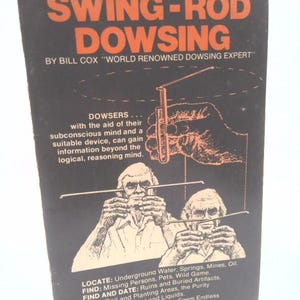 May include: A book cover with the title "TECHNIQUES OF SWING-ROD DOWSING" in orange and white text on a black background. The cover features illustrations of dowsers and a diagram of a dowsing rod. Text includes the author's name and applications.