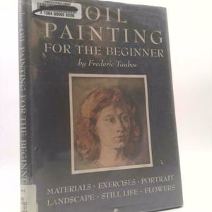 May include: A book titled "Oil Painting for the Beginner" by Frederic Taubes. The cover features a painting of a woman's face and the text "Materials, Exercises, Portrait, Landscape, Still Life, Flowers".