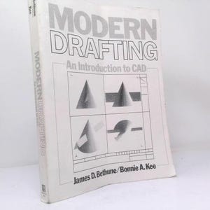 May include: A white softcover textbook titled Modern Drafting: An Introduction to CAD by James D. Bethune and Bonnie A. Kee. The cover features black line drawings of geometric shapes including cones and cylinders within a technical grid layout.