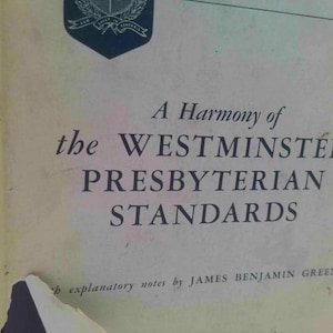May include: A hardcover book titled A Harmony of the WESTMINSTER PRESBYTERIAN STANDARDS with explanatory notes by JAMES BENJAMIN GREEN. The cover is off-white with dark blue text and a small dark blue crest at the top center.